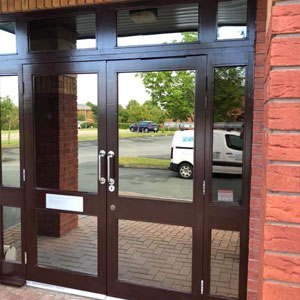 Commercial building entry doors freshly painted